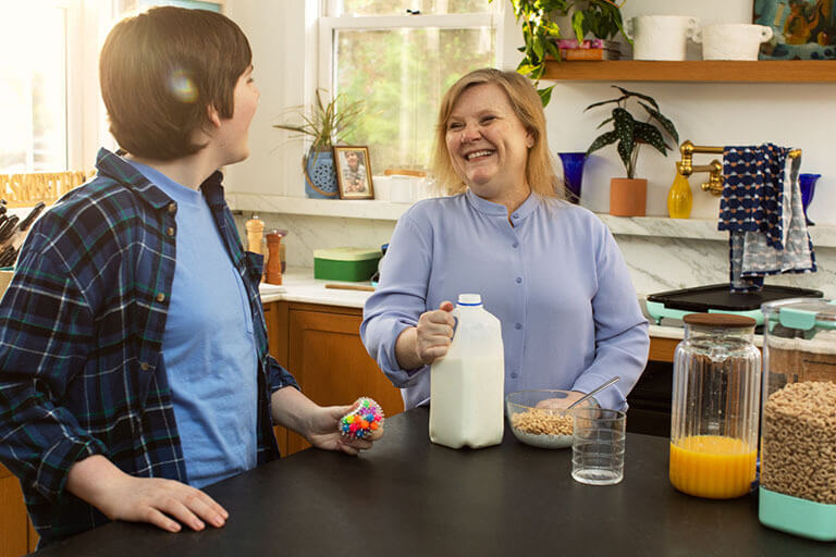 Mother and Son Making Breakfast